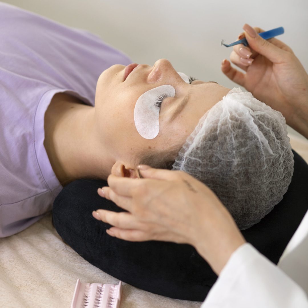 high-angle-professional-holding-tweezers